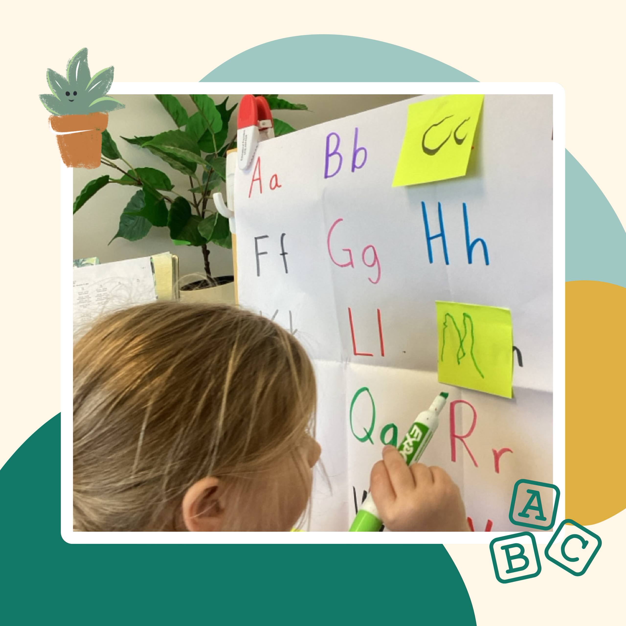 Preschool child learning letters with a colorful alphabet activity in the classroom